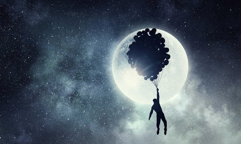Mann fliegt mit vielen Luftballons zum Mond
